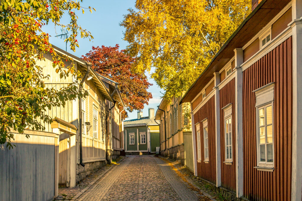 Old Rauma street with fall leaves.