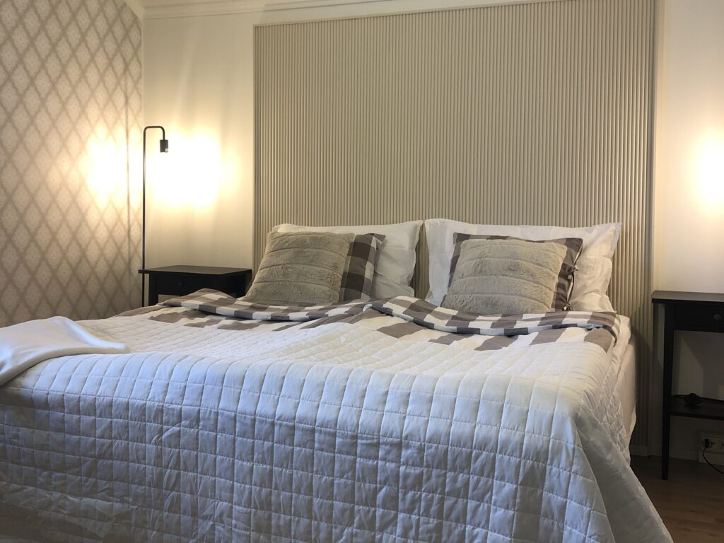 A bed in a room in Haus Anna hotel